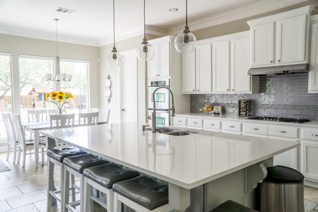 DIY Kitchen Repairs | Powell Realtors (showing a bright, modern white kitchen)