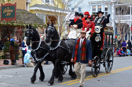 Horse drawn carriage with Christmas carol singers